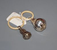 Two German 800 white metal babys rattles, with bone teethers, largest 44mm, gross 34 grams.