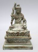 A Himalayan bronze seated figure of a deity, height 16cm