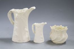 Two Royal Worcester 'leaf' jugs, a Royal Doulton jug, a Belleek posy vase and a 19th century Derby