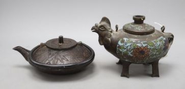 A Japanese bronze and champleve enamel phoenix vessel and a cast iron teapot