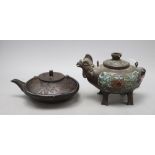 A Japanese bronze and champleve enamel phoenix vessel and a cast iron teapot