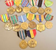 Fourteen US and WWII medals
