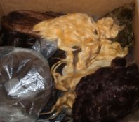 Twenty-six dolls' wigs, vintage and new