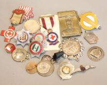 Assorted badges and other items
