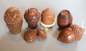 Five 19th century coquilla nut nutmeg graters and two condiment shakers, largest 7.2cm two items