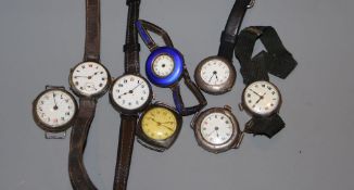 Eight assorted early 20th century and later silver wrist watches, including blue enamel case.