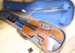 A cased violin, labelled Buthod, Paris, length of back 36cm, with bow stamped Tourte