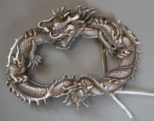 A Chinese white metal dragon buckle?, unmarked, 96mm, 49.1 grams.CONDITION: Good condition.