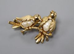 A modern 9ct gold and baroque pearl set 'birds on a branch' brooch, 28mm, gross 4.1 grams.CONDITION: