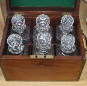 A brass bound six bottle decanter box, containing six cut glass bottles, height 24cm