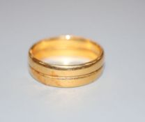 A 22ct gold double wedding band( two fused together), size N/O, 6.2 grams.