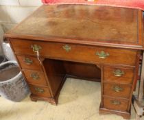 A George III mahogany kneehole desk, W.97cm, D.70cm, H.78cmCONDITION: The leather top is ring