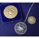 Three assorted medallions.