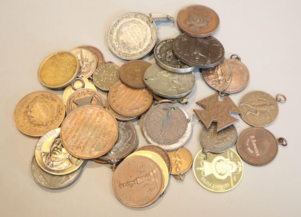 A group of assorted medallions