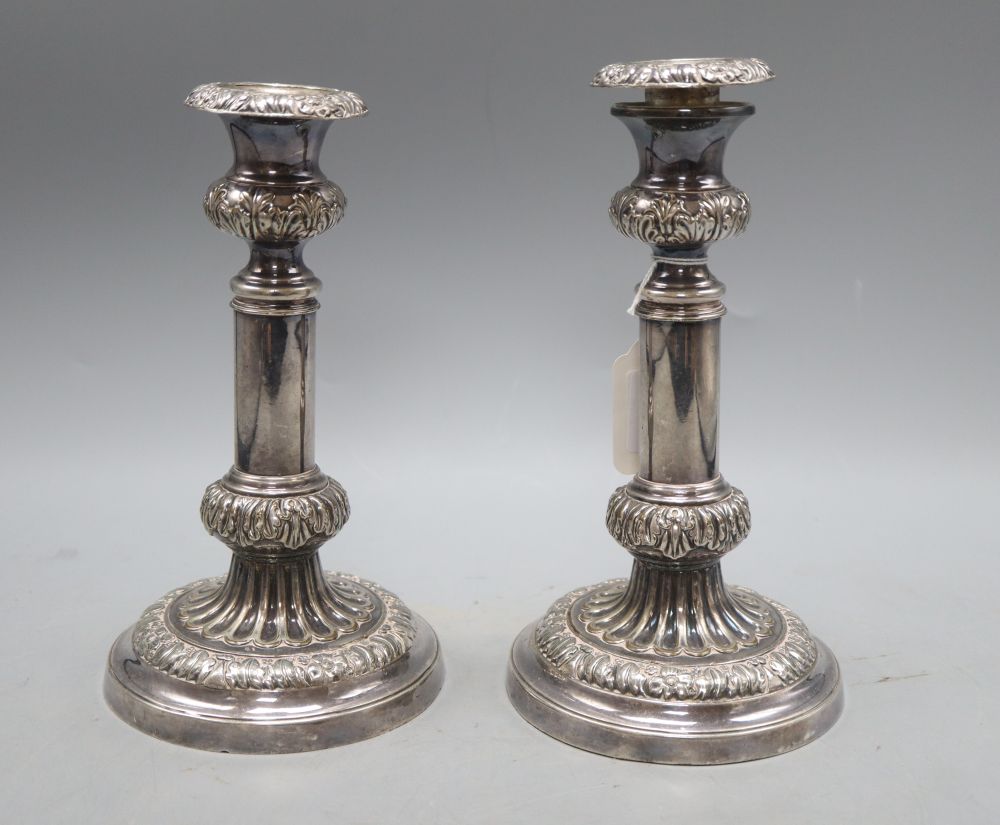 A pair of old Sheffield plate candlesticks