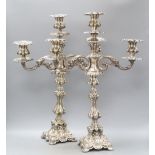 A pair of Continental two branch plated candelabra, height 53cm