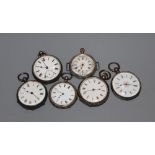 Five assorted early 20th century silver or white metal fob watches and a white metal wrist watch,