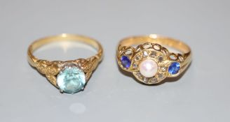 An early 20th century 18ct, cultured pearl blue paste and rose cut diamond set cluster ring, size M,