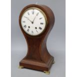 A mahogany balloon cased clock, with French movement, height 40cm