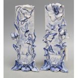 A pair of Delft Art Nouveau blue and white vases, height 21cm