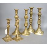 Three pairs of 19th century brass candlesticks, tallest 28cm