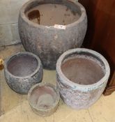 A set of four graduated garden planters, largest 46cm diameter, H.46cm