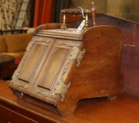 A Victorian brass mounted mahogany coal scuttle with scoop, W.34cm, D.46cm, H.40cmCONDITION: It