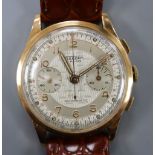 A gentleman's 1950's 18k Viscont chronograph manual wind wrist watch, with textured dial, on later