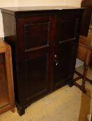 A 19th century two-door oak cupboard, W.101cm, D.34cm, H.124cmCONDITION: Formerly the top section of