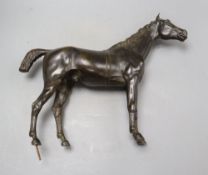 A late 19th/early 20th century bronze figure of a horse, height 30cm, lacking base