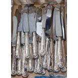 Two modern sets of six silver handled Kings pattern table knives and matching dessert knives, W.E.