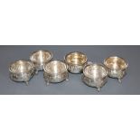 A set of six early 20th century Austrian 800 white metal salts, with clear glass liners, maker J.