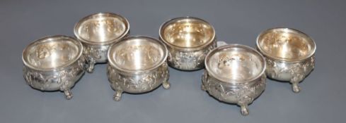 A set of six early 20th century Austrian 800 white metal salts, with clear glass liners, maker J.