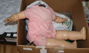 A large size doll's body, three others and torso's