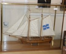 A cased model of a French naval schooner 'The Marseille 1764', in glazed case overall 84 x 63cm