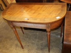 A George III banded satinwood folding card table, W.92cm, D.46cm, H.74cmCONDITION: The veneer to the