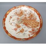 A Japanese Kutani dish, diameter 37cmCONDITION: There is a strip of restoration from the outer rim