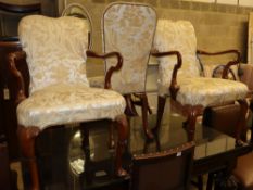 A pair and a single George I style walnut shepherd's crook armchairs