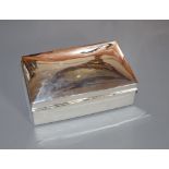 A George V silver mounted cigarette box by Walker & Hall, Birmingham, 1924, 14.2cm, gross 17.5 oz.