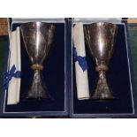 A pair of cased limited edition silver QEII Silver Wedding Commemorative goblets, Mappin & Webb,