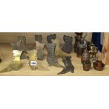 Eleven Victorian brass 'shoe' mantel ornaments / spill holders and a group of miniature copper and