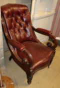 A Victorian mahogany ox blood leather open armchairCONDITION: The leather is quite supple, however