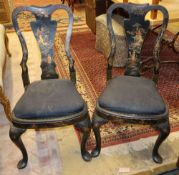 A pair of 1920's chinoiserie lacquer dining chairs