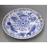 A Chinese blue and white 'fish' dish, diameter 36cm (a.f.)CONDITION: Broken into several pieces