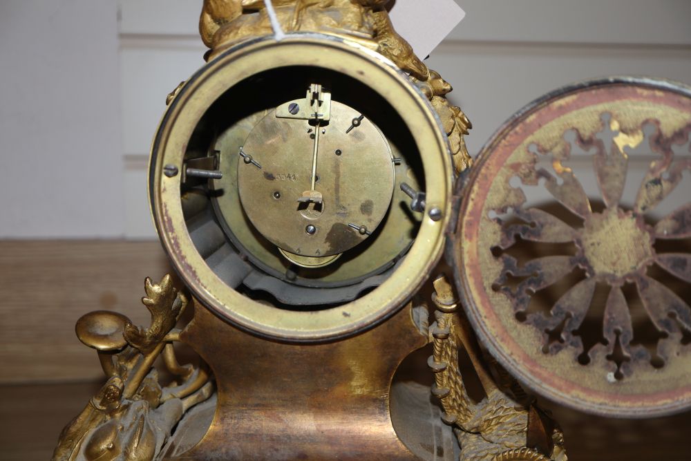 A 19th century French Louis XVI style ormolu mantel clock and a pair of associated spelter table - Image 3 of 6