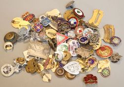 A large quantity of vintage badges