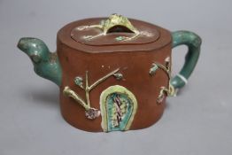 A 19th century Chinese Yixing enamelled teapot and cover, height 11cmCONDITION: There are several