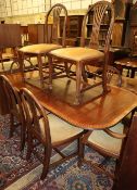 A set of eight Hepplewhite style mahogany dining chairs (two with arms), together with a George