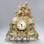 A German brass figural mantel timepiece, height 43cm