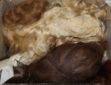 Sixteen wigs, vintage and new